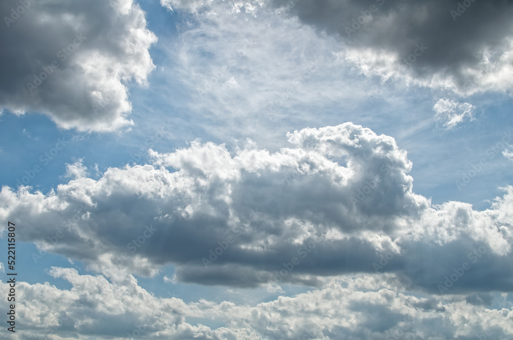 Naklejka premium Cumulus Cumulonimbus Stratocumulus clouds in the sky