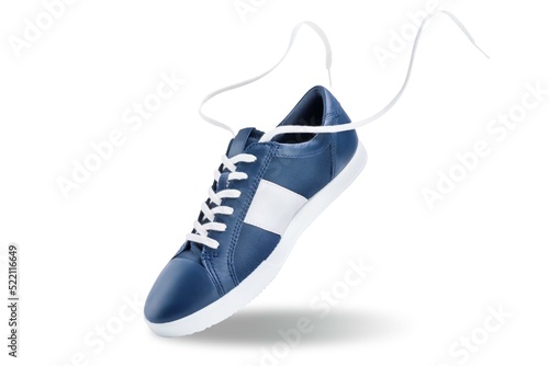 Blue sneakers on a white isolated background