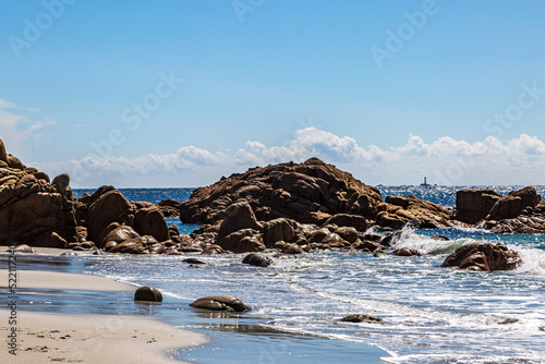 A view over the ocean towards Longships Lighthouse, from Porth Nanven beach photo