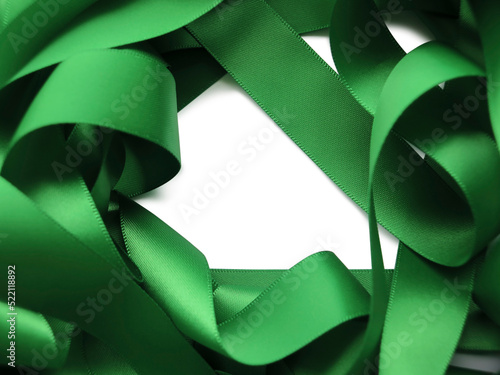 Green ribbon over transparent background, design element