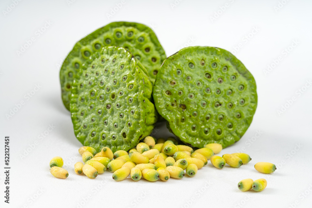 Fresh lotus seeds on a simple background Fresh lotus seeds on a simple background