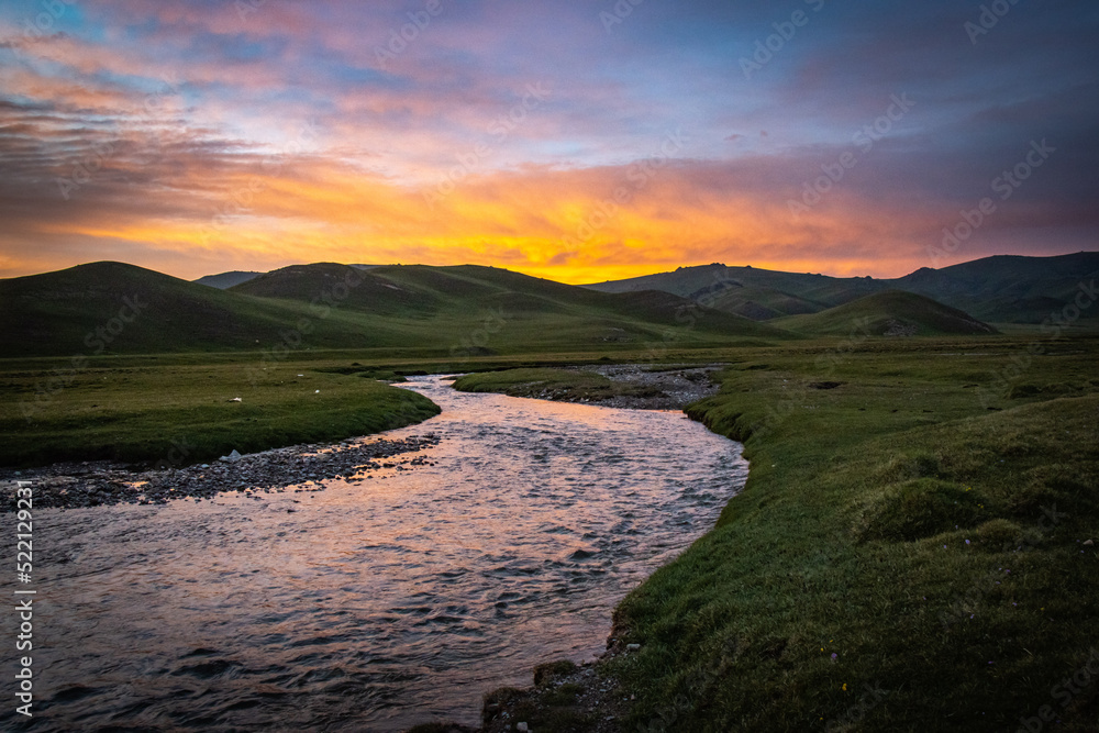 river, sunset at mountains in Kyrgyzstan, Song-Köl, Central Asia,