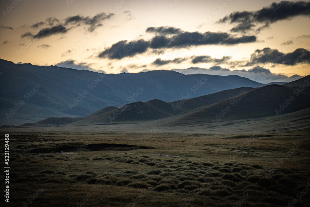 sunrise in the mountains, near song-köl lake, kyrgyzstan, central asia, summer pasture