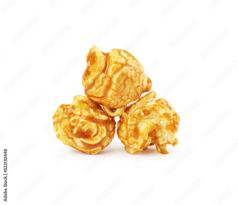 popcorn in caramel on a white background popcorn in caramel on a white background