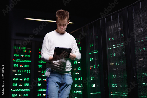 IT specialist controlling security of database  photo