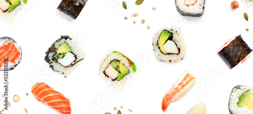 Creative layout made of  sushi on the white background. Flat lay. Food concept. Macro  concept. Sushi,salmon,avocado,rice,sticks,california rolls on the white background.