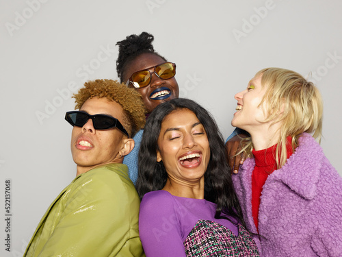 Group of friends laughing loudly