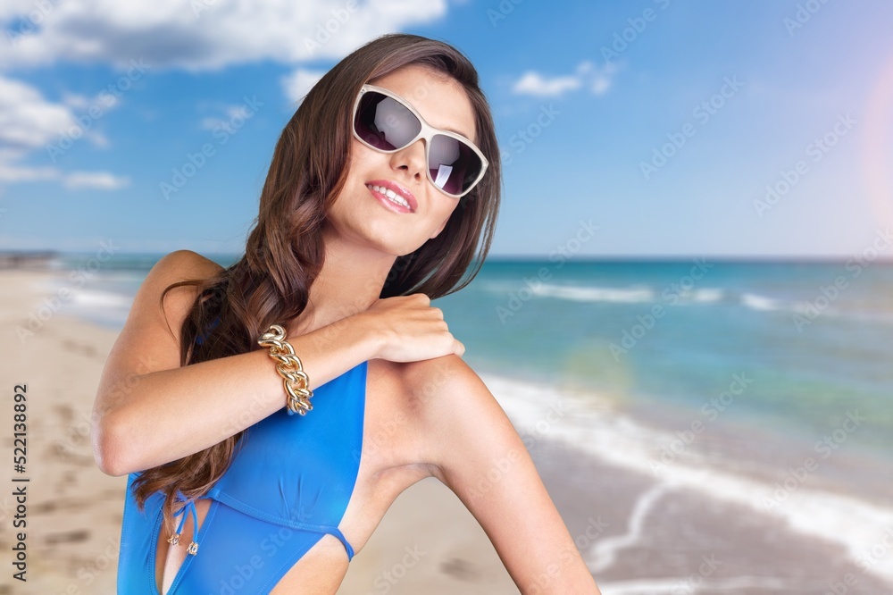 Woman wearing beautiful bikini on tropical beach Woman wearing beautiful bikini on tropical beach