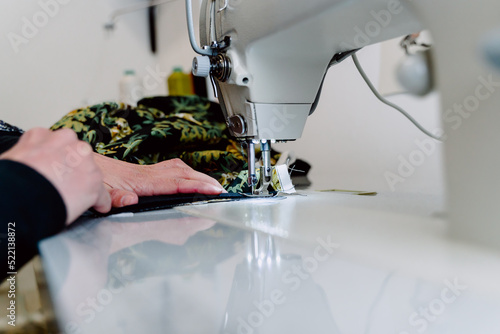 Obraz na płótnie professional sewing machine to design clothes at high speed w salonie