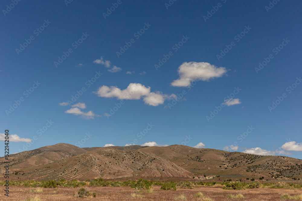 A view on the desert with mountains and sky