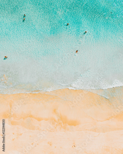 Beach goers enjoying the beach in Miami Beach, Florida during the winter.