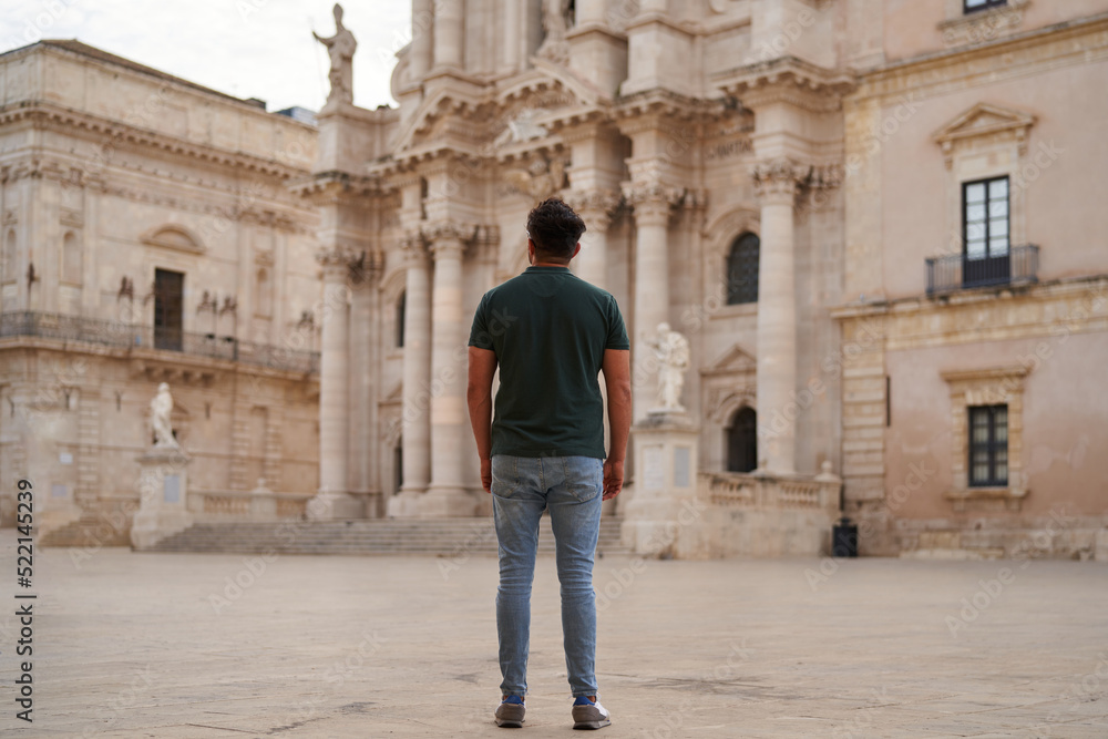 A man at Piazza Duomo at Syracuse, Sicily A man at Piazza Duomo at Syracuse, Sicily