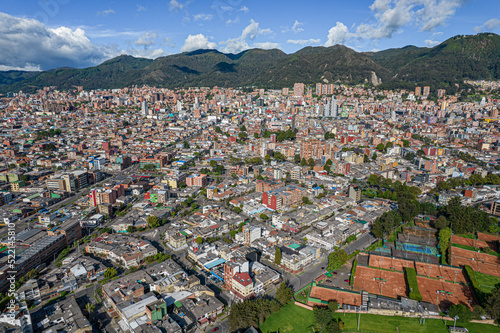 Autopista norte de Bogotá (Colombia ) a la altura de la av NQS, Usaquen y al fondo el centro internacional de la ciudad adornada por sus majestuosos cerros y edificaciones como torre sigma photo