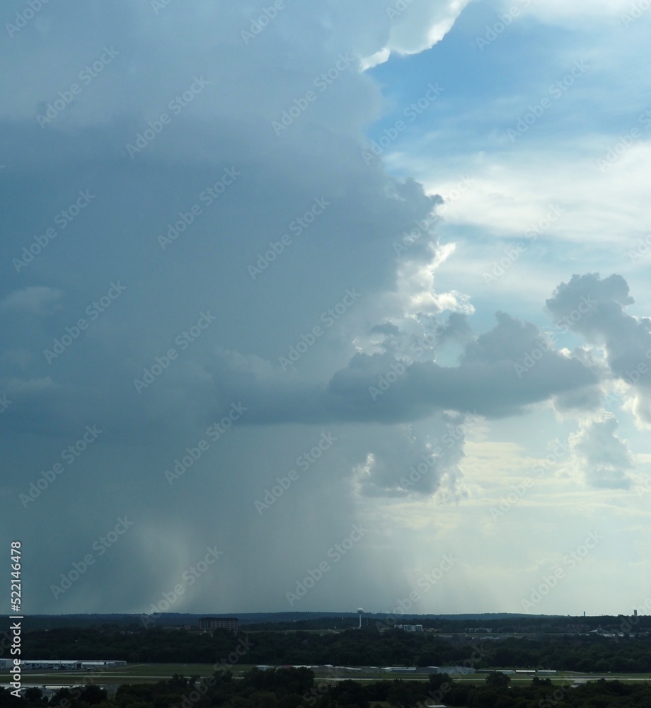 Downburst southwest of downtown Tulsa on 8-8-22. In the foreground is Riverside Airport. Downbursts are a hazard to aviation. 