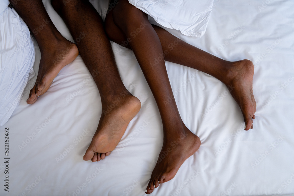 Cuddling under white sheet Cuddling under white sheet
