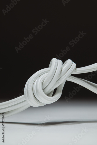 Electrical Power Cord and Wire tied in Knot photo