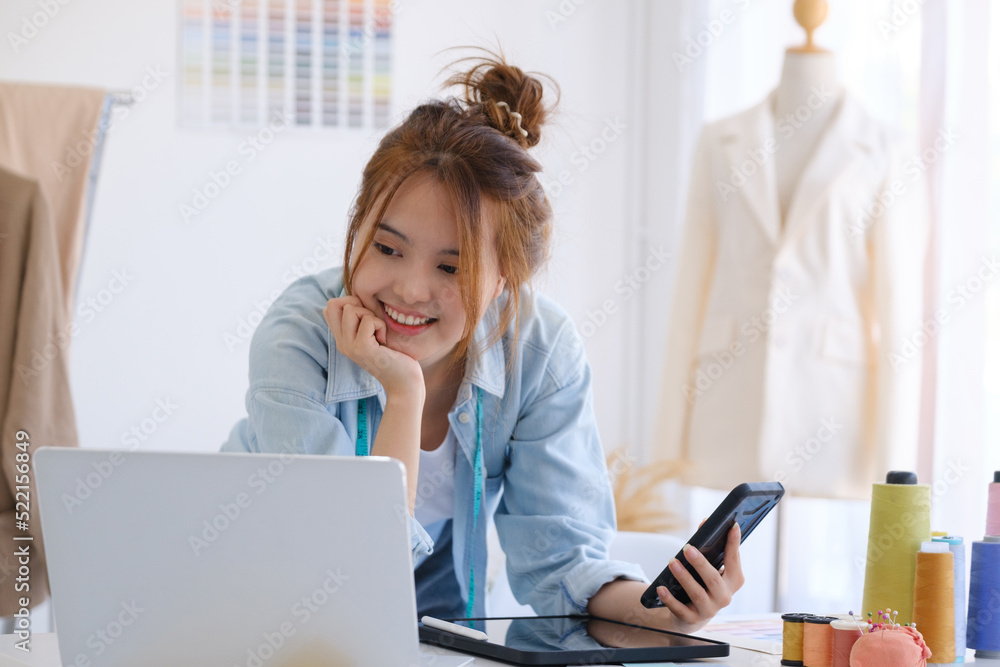 Fashion designer working in studio Fashion designer working in studio
