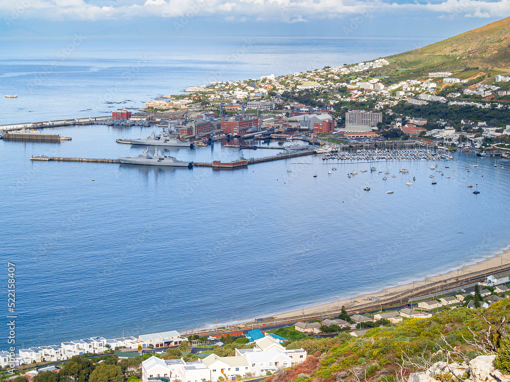 South Africa aerial coastal scene with marina and naval base in bay.