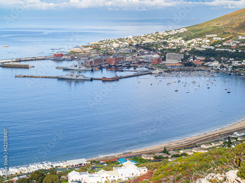 South Africa aerial coastal scene with marina and naval base in bay.