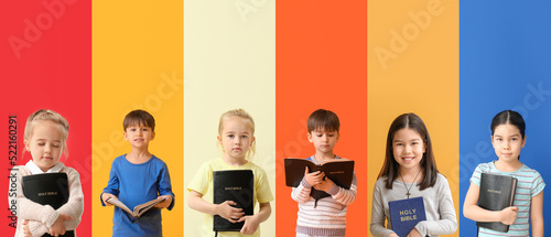 Bild auf Leinwand Set of children with Bible on color background
