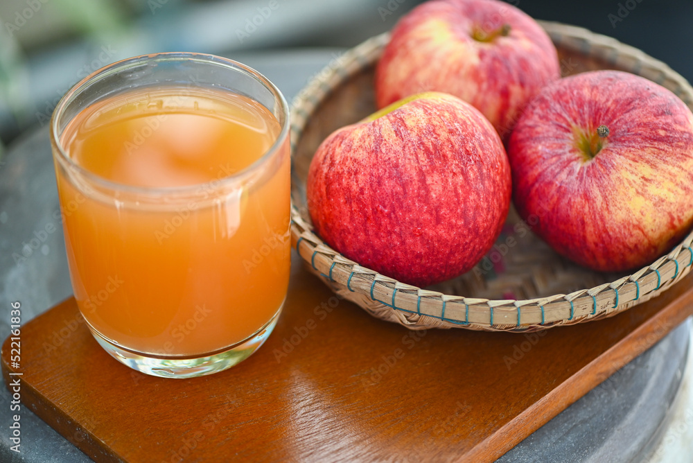apple cider vinegar natural remedies and cures for common health condition, raw and unfiltered organic apple cider vinegar in glass with apple fruit on basket on the wooden table apple cider vinegar natural remedies and cures for common health condition, raw and unfiltered organic apple cider vinegar in glass with apple fruit on basket on the wooden table