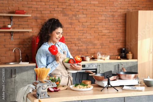 Young woman with colander a...