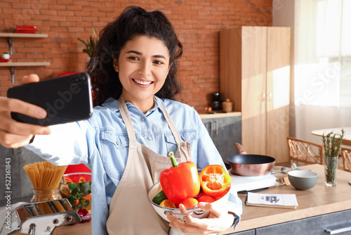 Young woman with colander a...