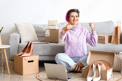 Beautiful woman with credit...