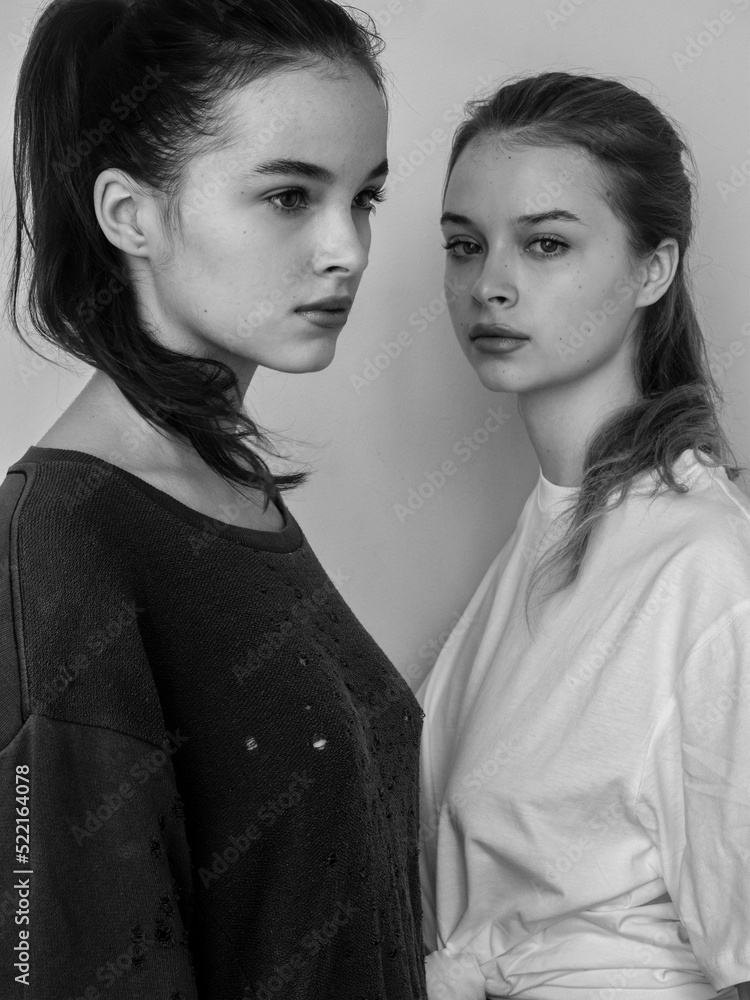Portrait of young beautiful model sisters Portrait of young beautiful model sisters