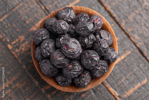 Freeze Dried Blueberries Isolated on a Dark Wooden Table