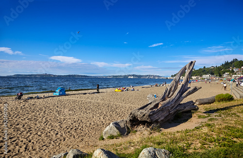 Photography Warm, sunny weather brings people out to Alki Beach, West Seattle, Washington