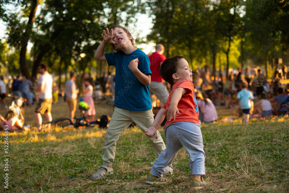 Kids dancing funny, play in a park Kids dancing funny, play in a park