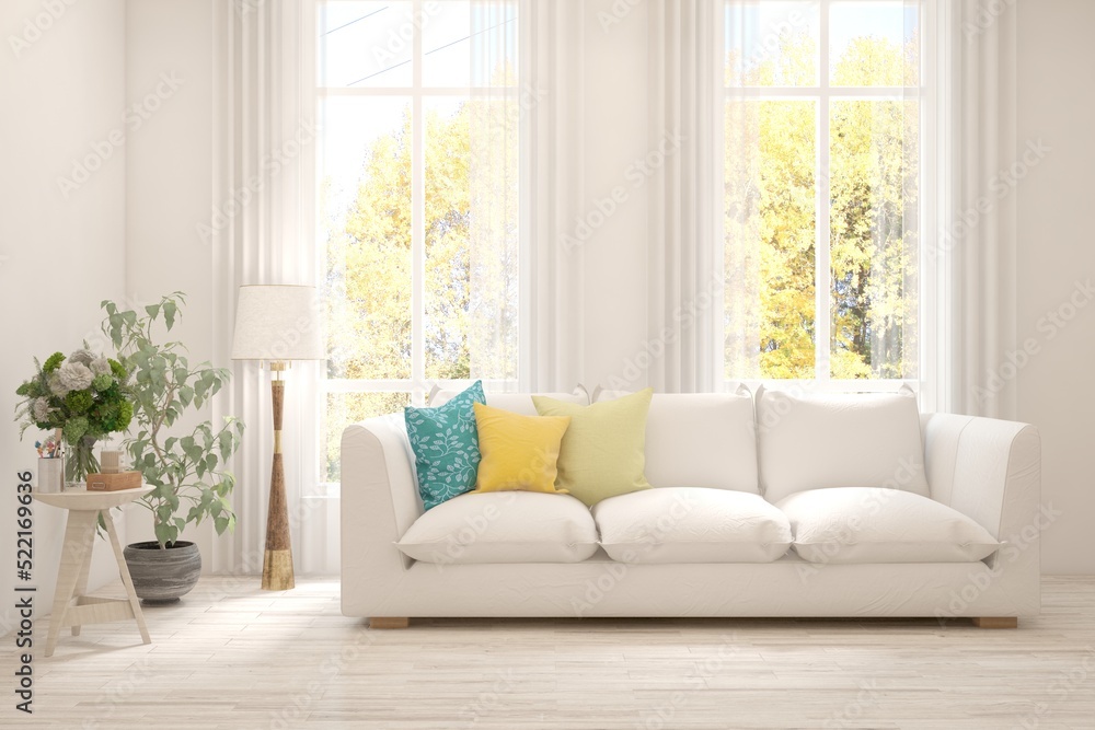 Stylish room in white color with sofa and autumn landscape in window. Scandinavian interior design. 3D illustration Stylish room in white color with sofa and autumn landscape in window. Scandinavian interior design. 3D illustration