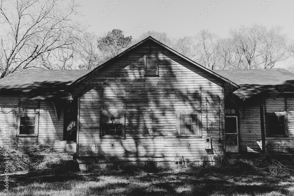 Stock photo of shadows across abandoned home in rural Alabama Stock photo of shadows across abandoned home in rural Alabama