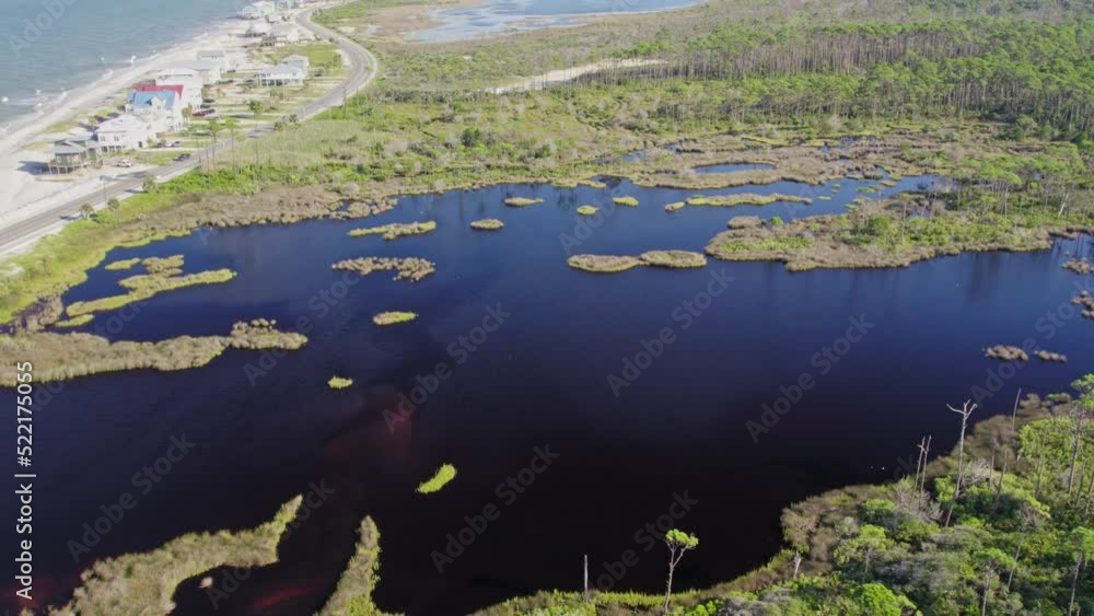 Aerial flight showing a beautiful pristine bay along a peninsula in the Gulf of Mexico Aerial flight showing a beautiful pristine bay along a peninsula in the Gulf of Mexico