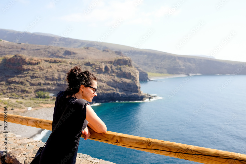 A girl watching the sea. A girl watching the sea.