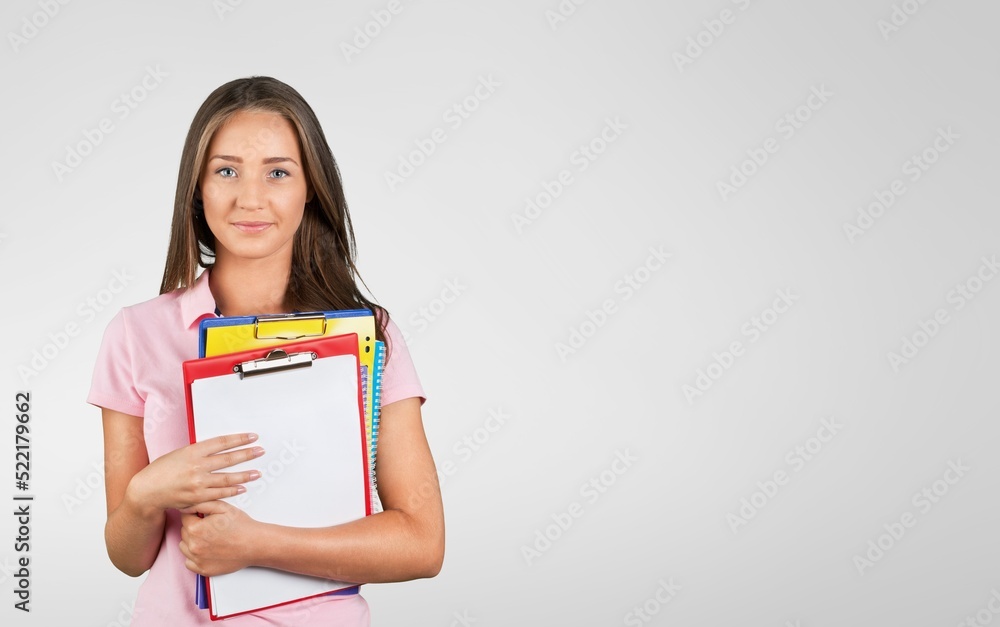 Happy high school student beautiful girl show a book Happy high school student beautiful girl show a book