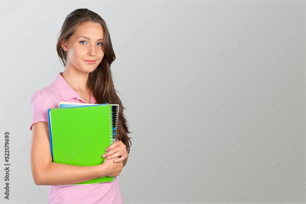 Happy high school student beautiful girl show a book Happy high school student beautiful girl show a book