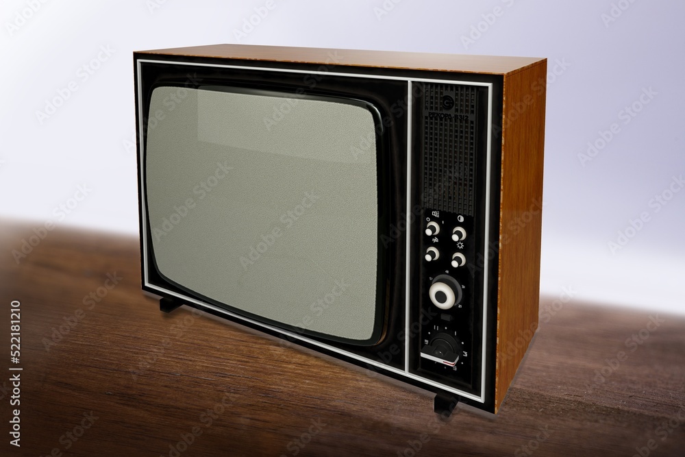 An old retro TV standing in front of the wall in the room. Antique and vintage television images. An old retro TV standing in front of the wall in the room. Antique and vintage television images.
