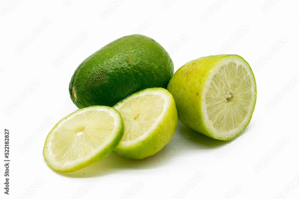 whole and slice Lemons isolated on white background. whole and slice Lemons isolated on white background.