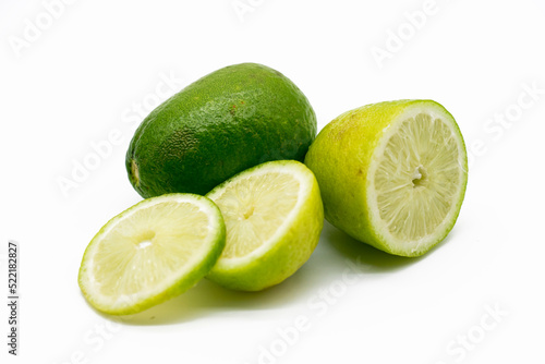 whole and slice Lemons isolated on white background.