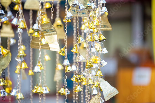 Many small bells were hung to decorate the place beautifully.