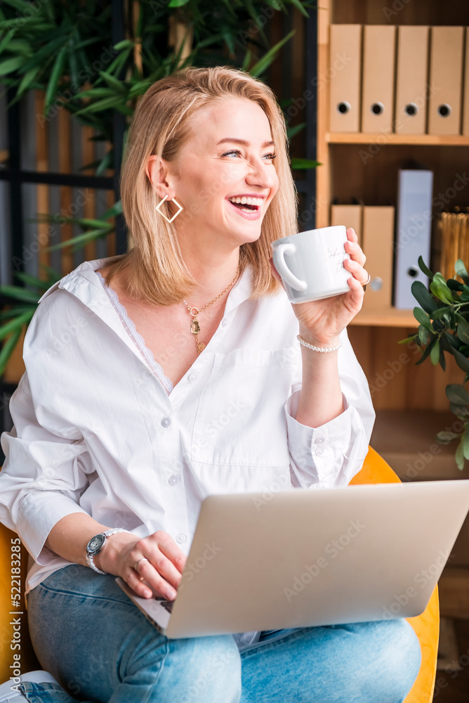 beautiful, blonde, blonde businesswoman, business, businesswoman, by the window, casual, caucasian, coffee, communication, computer, drinking coffee, education, face time, female, freelance, freelance beautiful, blonde, blonde businesswoman, business, businesswoman, by the window, casual, caucasian, coffee, communication, computer, drinking coffee, education, face time, female, freelance, freelance