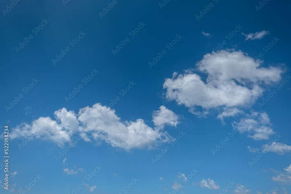 white clouds in the blue sky. cumulus. white clouds in the blue sky. cumulus.