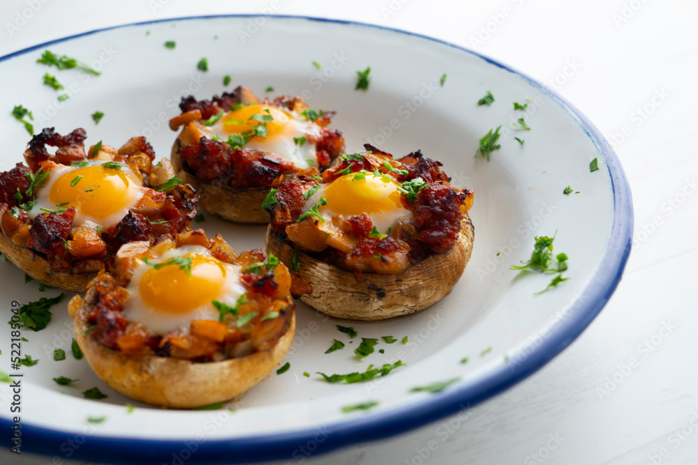 Mushrooms stuffed with chorizo and quail eggs. Mushrooms stuffed with chorizo and quail eggs.