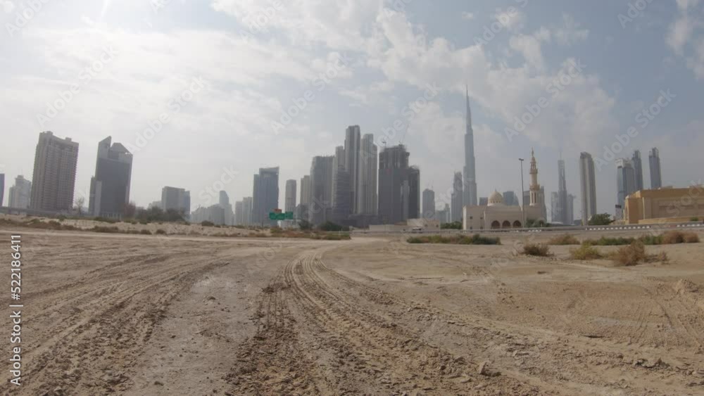 Journey, middle eastern road trip, first-person view on a deserted road, skyscrapers on the horizon, trip in an arab country, timelapse. Journey, middle eastern road trip, first-person view on a deserted road, skyscrapers on the horizon, trip in an arab country, timelapse.