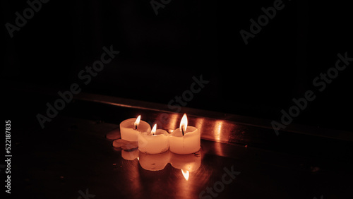burning candle in the hand