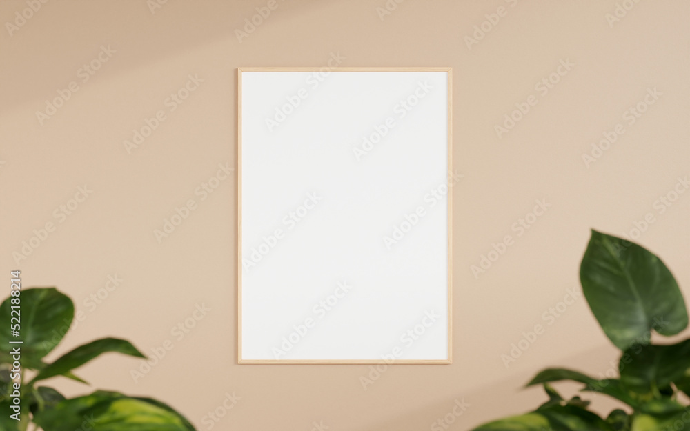 Clean and minimalist front view vertical wooden photo or poster frame mockup hanging on the wall with blurry plant. 3d rendering.