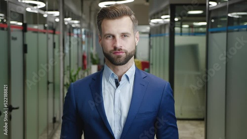 Wallpaper Mural Portrait of bearded millennial professional businessman looking at camera. Confident handsome smart young adult entrepreneur, leader, manager standing in modern office. Torontodigital.ca