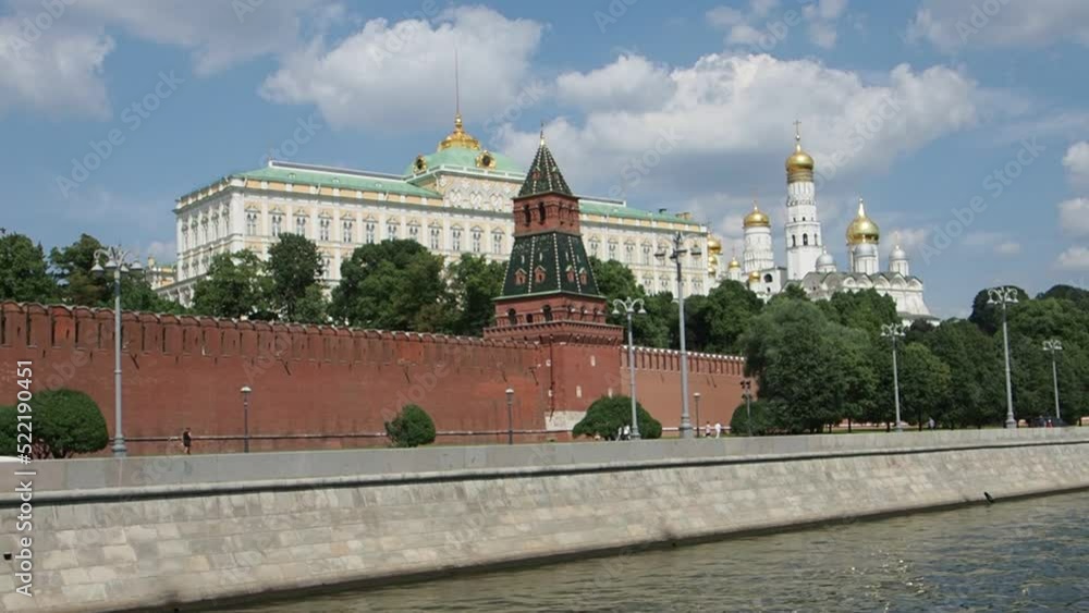 Moscow Kremlin with towers, administrative building and Orthodox churches from automobile bridge over Moscow River. Moscow Kremlin with towers, administrative building and Orthodox churches from automobile bridge over Moscow River.